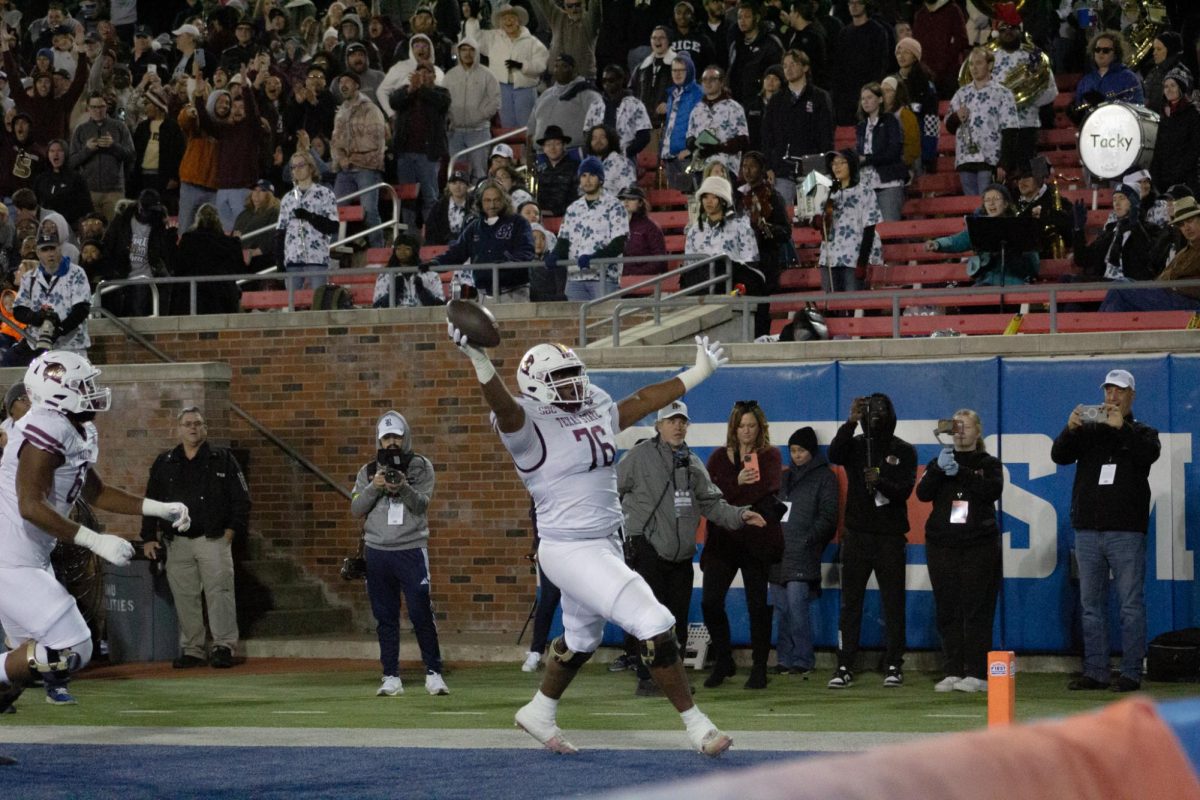 Texas State junior offensive lineman Nash Jones (76) scores a touchdown off the trick play versus Rice during the SERVPRO First Responder Bowl game, Tuesday, Dec. 26, 2023, in Gerald J. Ford Stadium.