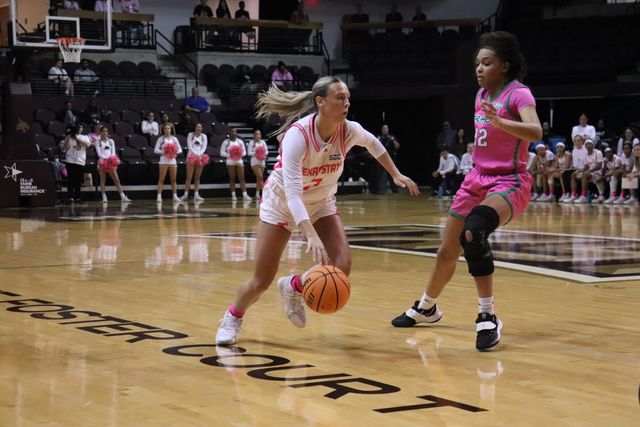 Texas State graduate student guard Gara Beth Self (2) dribbles past her defender, Wednesday, Feb. 21, 2024, at Strahan Arena.