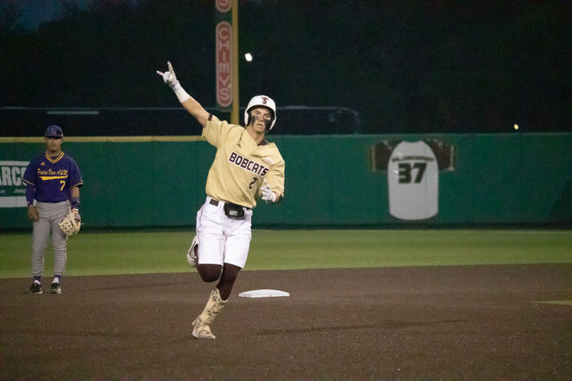 Texas State sophomore infielder Chase Mora (2) celebrates hitting a home run, Tuesday, Feb. 27, 2024, at Bobcat Ballpark. 