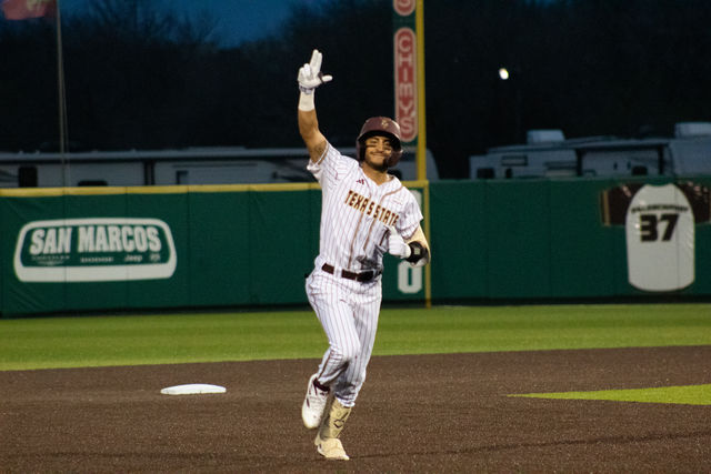 Texas State infielder junior Aaron Lugo (1) celebrates a a home run during the game against Youngstown State Friday, Feb. 16, 2024, at Bobcat Ballpark.