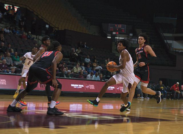 Texas State sophomore guard Jordan Mason (5) drives to the basket, Saturday, Feb. 10, 2024, at Strahan Arena. 