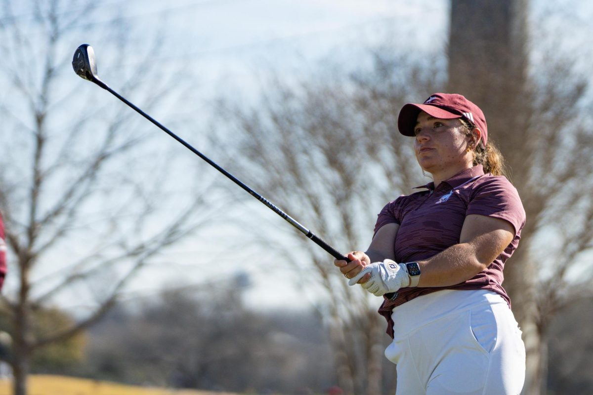 Texas State graduate student golfer Hailey Jones watches the ball after hitting it during the Texas State Invitational, Tuesday, Feb. 7, 2024, at the Landa Park Golf Club in New Braunfels, Texas. 