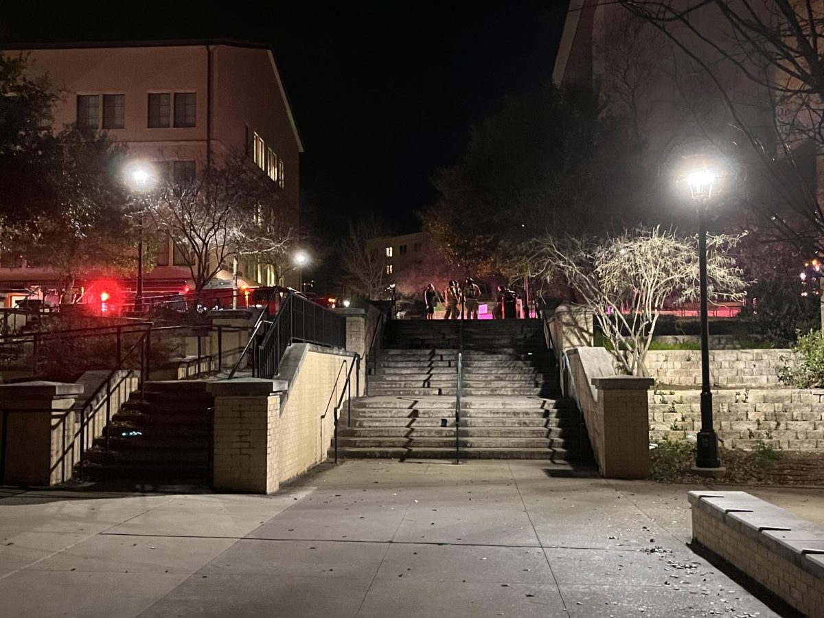 San Marcos firefighters stand outside of Alkek Library after putting out the fire, Friday, February 16, 2023 in San Marcos. 