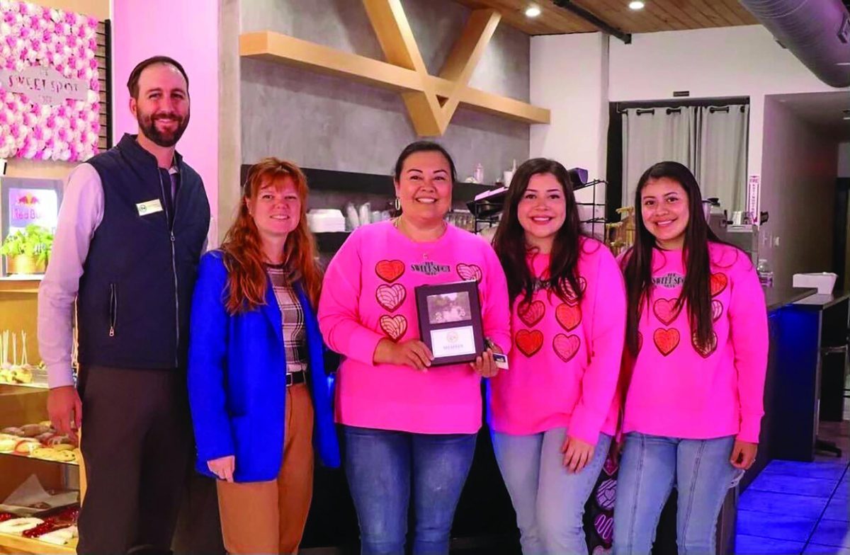 Owner of The Sweet Spot Debbie De La Cruz and her daughters receiving recognition at their ribbon cutting ceremony, Jan. 18, 2024 at The Sweet Spot.
