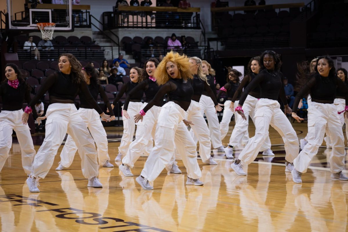 Texas State strutters dance their hiphop routine during the halftime show at the womens basketball game against Marshall, Wednesday, Feb. 21, 2024, at Strahan Arena.