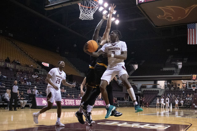 Texas State junior guard Dontae Horne (2) attempts a layup, Tuesday, Feb. 27, 2024, at Strahan Arena. 
