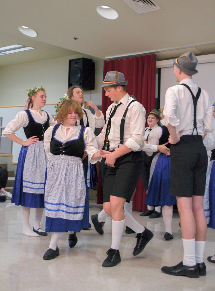 Students from La Grange High School perform a number for their German folk dance competition, Saturday, Feb. 24, 2024, in Centennial Hall.