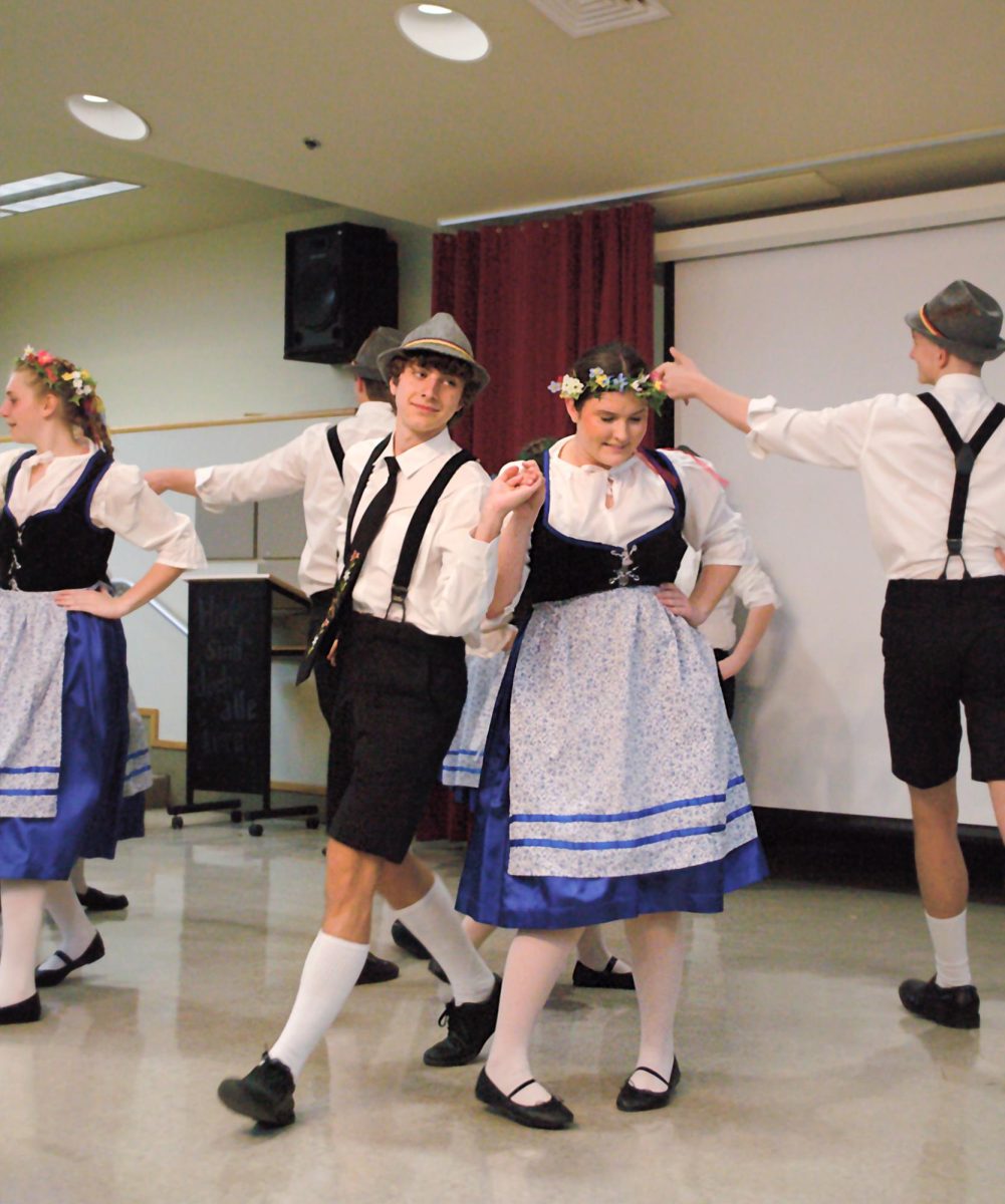 Students from La Grange High School move through their German folk choreography, Saturday, Feb. 24, 2024, outside of Centennial Hall.