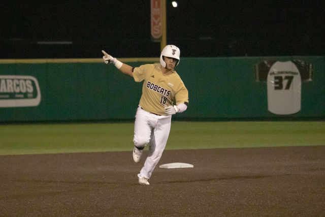 Texas State senior catcher August Ramirez (18) rounds the bases after hitting a grand slam, Tuesday, Feb. 27, 2024, at Bobcat Ballpark. 