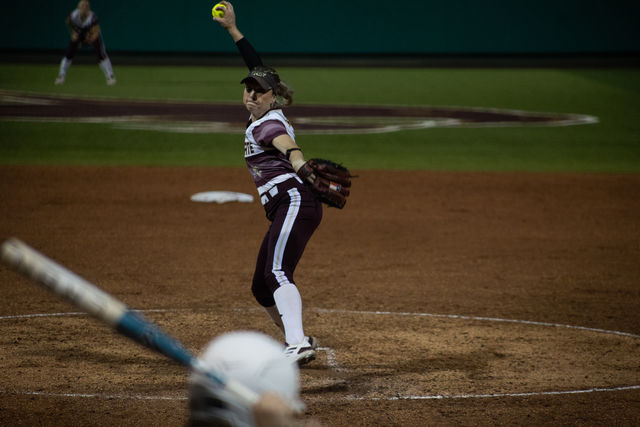 Texas State senior pitcher Jessica Mullins (4) prepares to pitch the ball during the game against Penn State, Thursday, March. 7, 2024, at Bobcat Softball Stadium.
