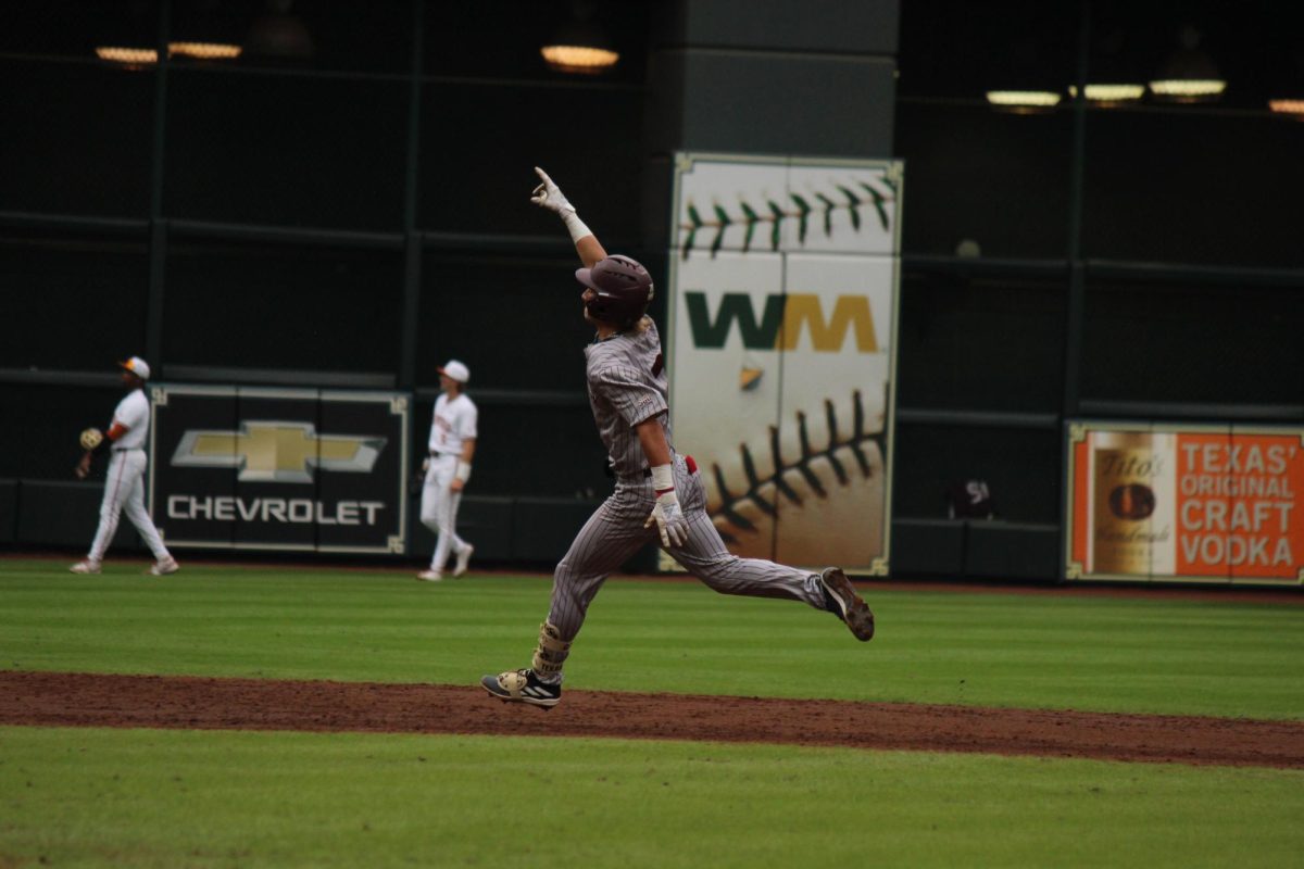 Texas State sophomore infielder Chase Mora (2) celebrates his grand slam against Texas, Saturday, March. 2, 2024, at Minute Maid Park in Houston.
