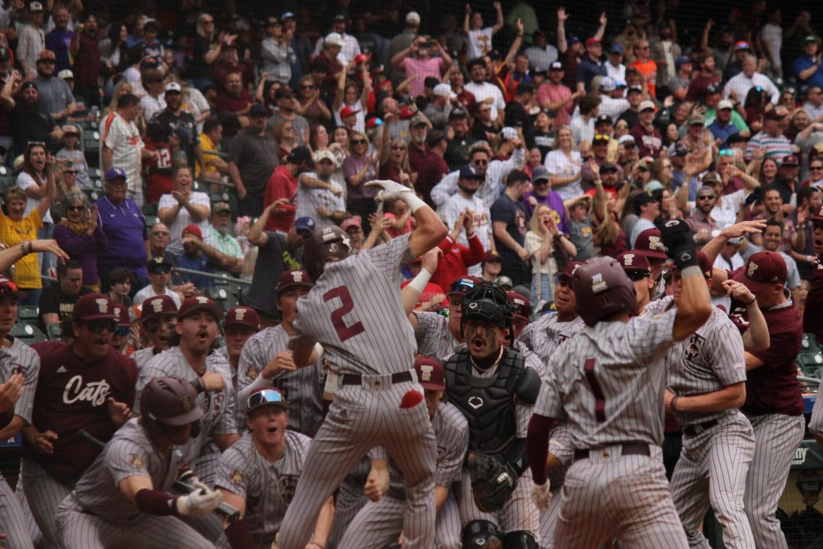 Texas State baseball celebrates a boom after sophomore infielder Chase Moras (2) grand slam, March 2, 2024, Minute Maid Park.