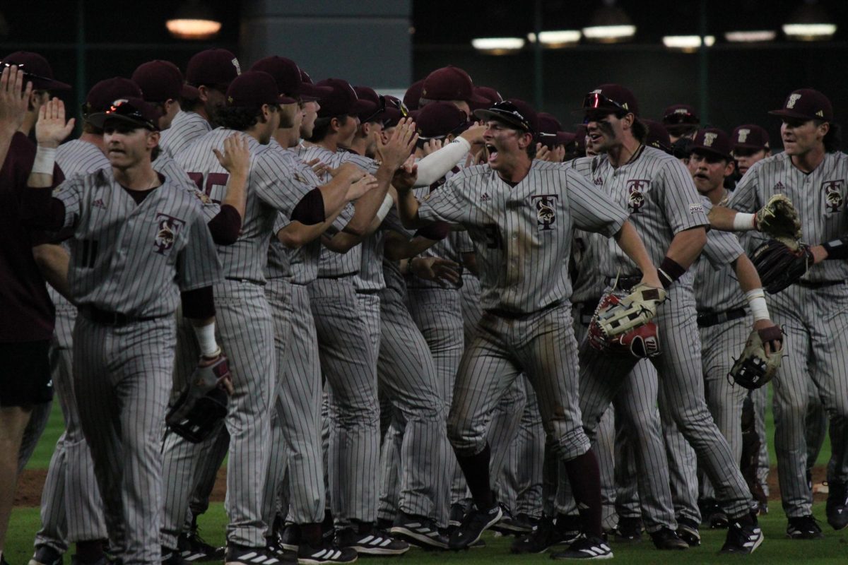 Texas State baseball celebrates the win against the University of Texas,  March 2, 2024, Minute Maid Park.