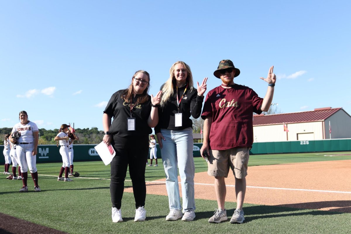 Mega Webb (left), Audrey Tuttle (middle) and Aaron Farmer (right) before the softball game versus Appalachian State, March 22, 2024, at Bobcat Softball Stadium.