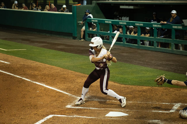Texas State senior outfielder Piper Randolph (11) prepares to bat during the game against Penn State Thursday, March. 7, 2024, at Bobcat Softball Stadium.