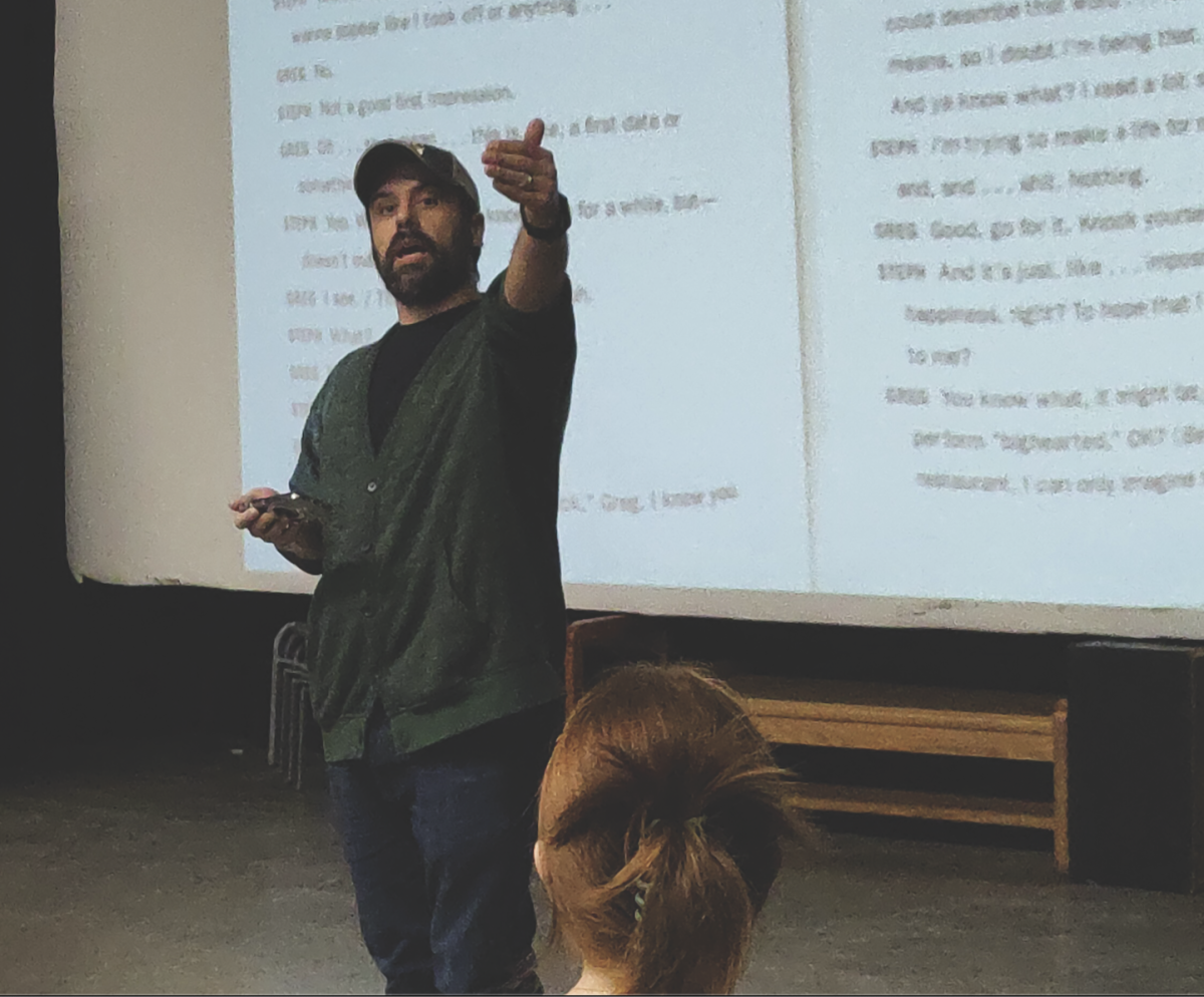 Lecturer Nick Lawson analyzes text from a play, Wednesday, Feb. 28, in the Department of Theatre and Dance.