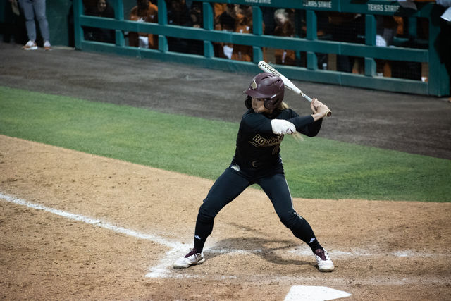 Texas State senior outfielder Piper Randolph (11) steps up to the plate during the game against Texas, Wednesday, Feb. 28, 2024, at Bobcat Softball Stadium.