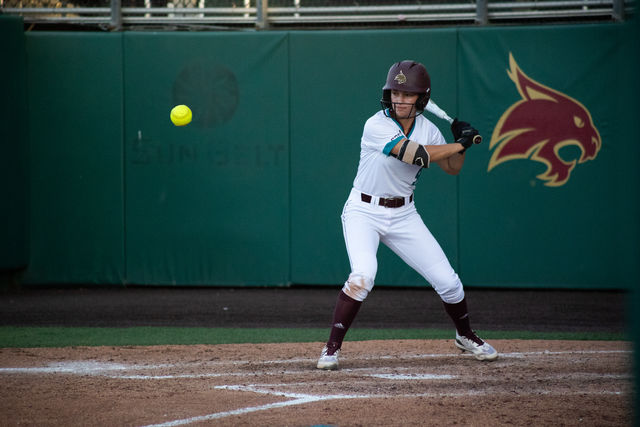 Texas State sophomore utility Sydney Harvey (9) prepares to hit the ball during the game against #21 Baylor, Wednesday, April 3, 2024, at Bobcat Softball Stadium.