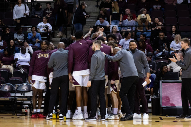 The Texas State mens basketball team huddles together before the game against Marshall, Saturday, Jan. 6, 2024, at Strahan Arena.