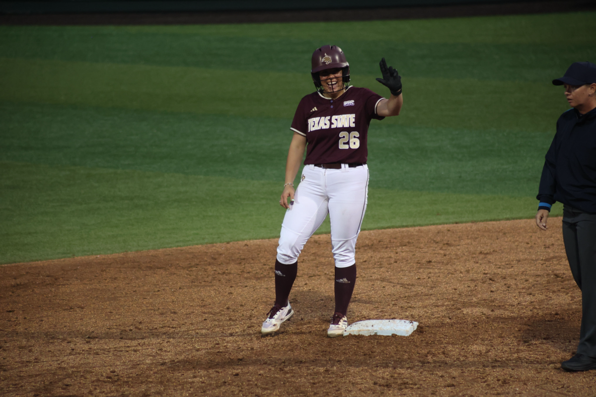 Texas+State+graduate+student+infielder+Sara+Vanderford+celebrates+advancing+bases+during+the+game+against+Texas+A%26M%2C+Wednesday%2C+March+20%2C+2024%2C+at+Bobcat+Softball+Stadium