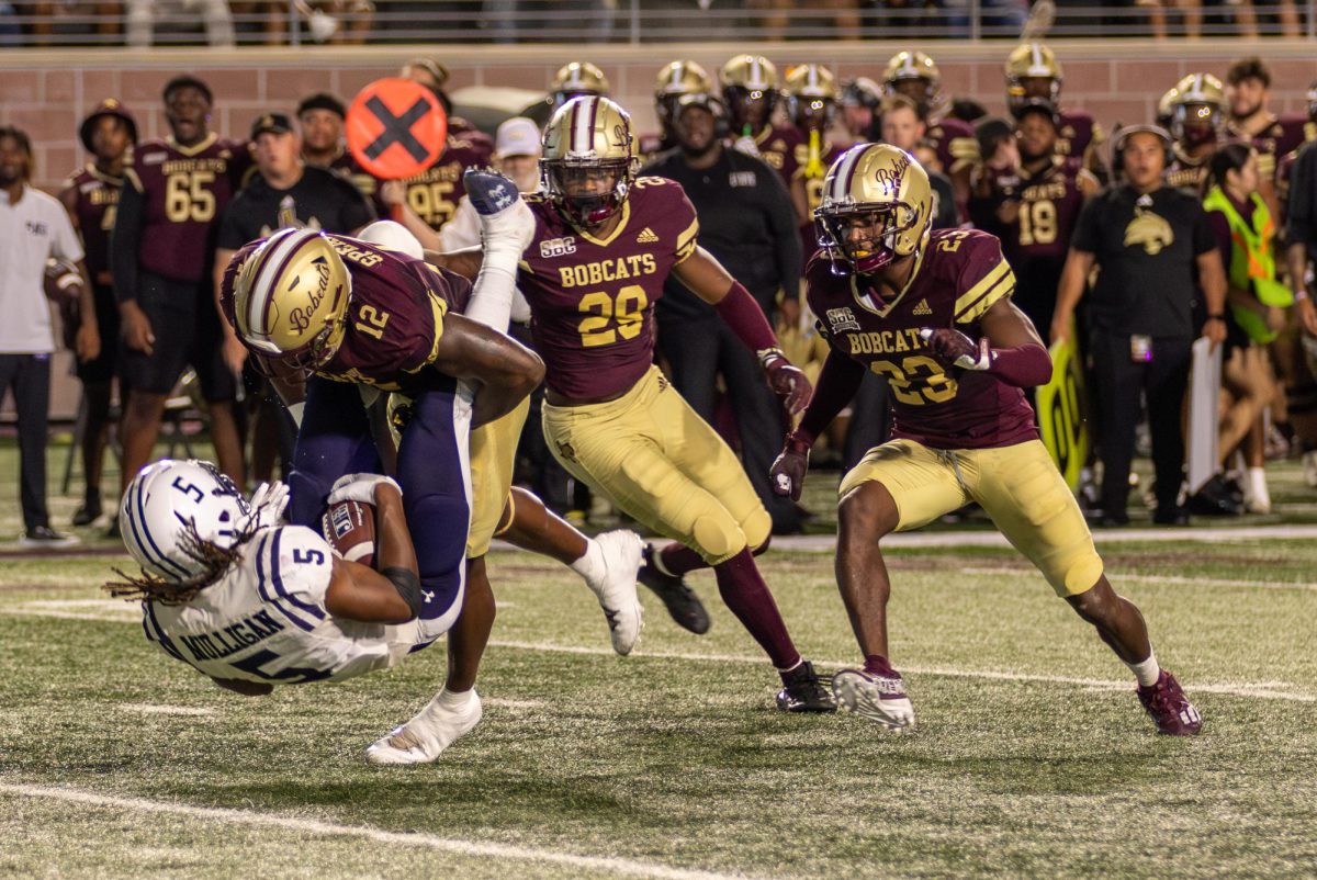 Texas State redshirt senior safety Tory Spears (12) tackles a Jackson State player, Saturday, Sept. 16, 2024, at Bobcat Stadium. 