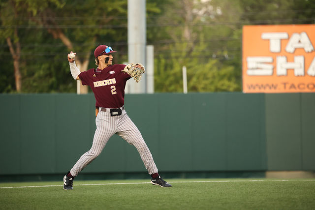 Texas State sophomore infielder Chase Mora (2) looks to make a play at first during at the game against the University of Texas, Wednesday, April 10, 2024, at UFCU Disch-Falk Field.