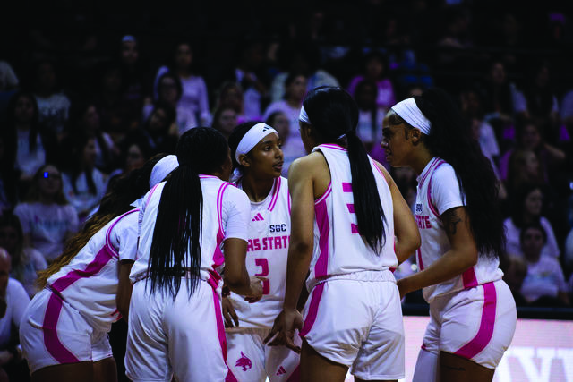 The Texas State womens basketball team huddles together during the game against Marshall, Wednesday, Feb. 21, 2024, at Strahan Arena.