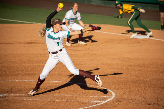 Texas State senior pitcher Jessica Mullins (4) throws the ball during the game against #21 Baylor, Wednesday, April 3, 2024, at Texas State Softball Stadium.