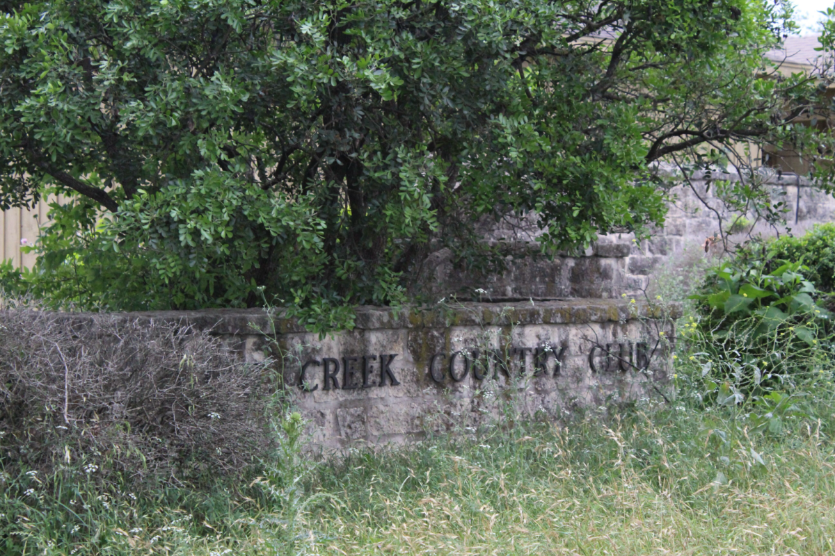 The Quail Creek Country Club sign is overtaken by weeds and trees, Friday April 19, 2024, in San Marcos.