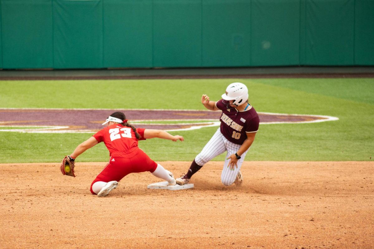 Texas State sophomore catcher Karmyn Bass (10) slides to second base during the Sun Belt Conference Championship versus the University of Louisiana-Lafayette, Saturday, May 11, 2024, at Bobcat Softball Stadium.