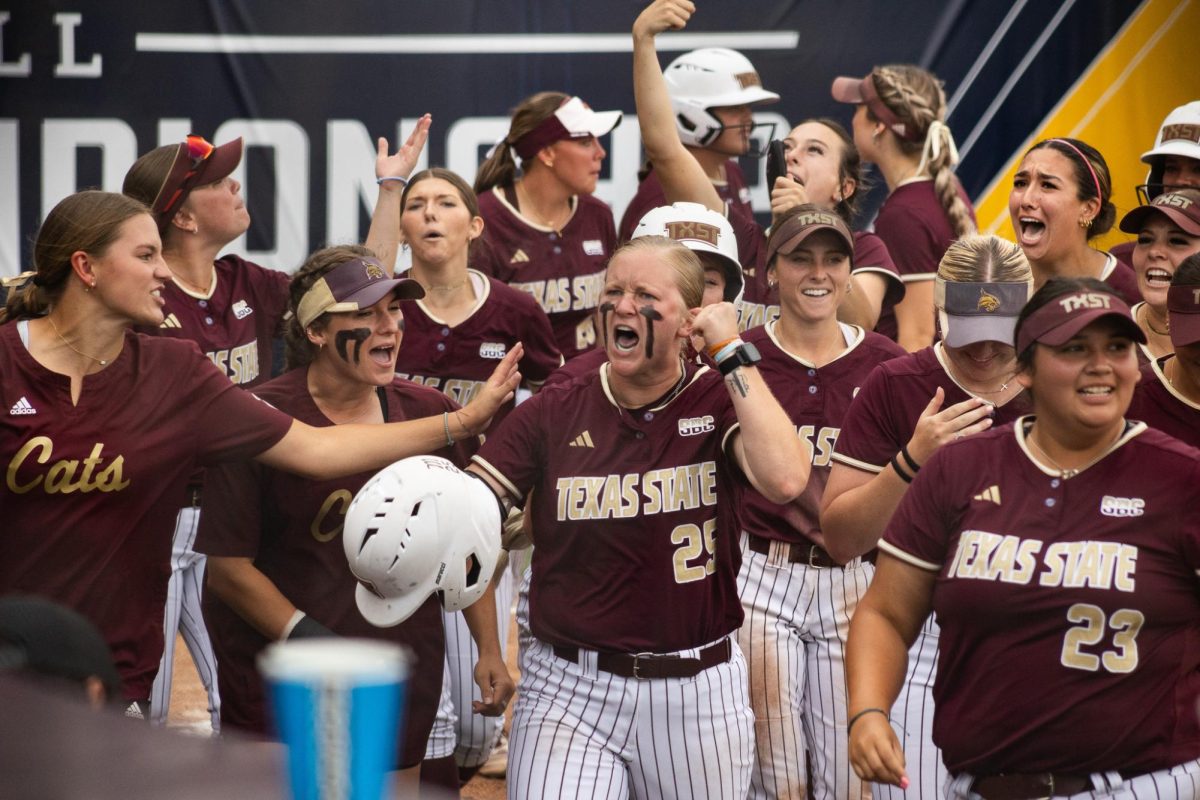 The+Texas+State+softball+team+celebrate+J.J.+Smiths+%2825%29+home+run+against+the+University+of+Louisiana-Lafayette+in+the+Sun+Belt+Conference+Championship+game%2C+Saturday%2C+May+11%2C+2024%2C+at+Bobcat+Softball+Stadium.