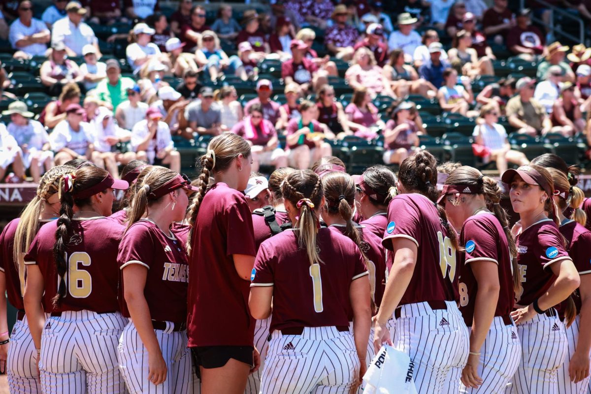 Texas State softball players huddle up before the game against Texas A&M at the NCAA Regionals tournament, Saturday, May 18, 2024, at Davis Diamond in College Station, Texas.