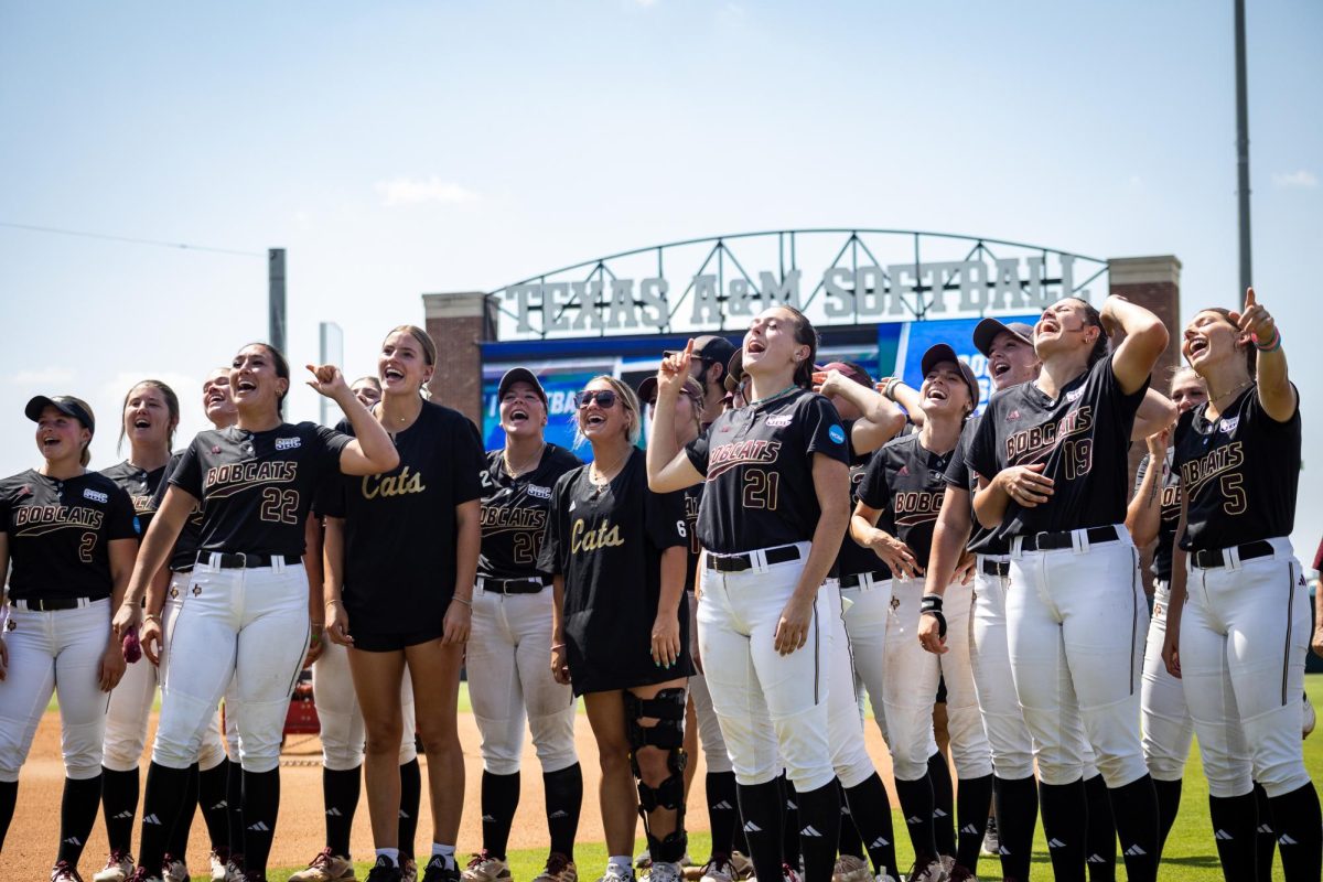 Texas State softball players do one last chant with the crowd after their loss to A&M at the NCAA Regionals Tournament, Sunday, May 19, 2024, at Davis Diamond in College Station, Texas. 