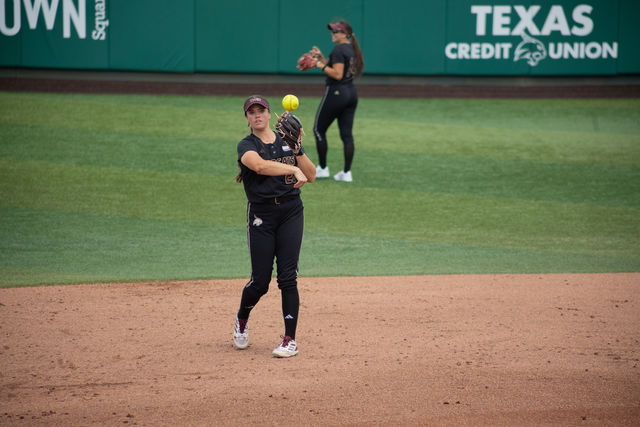 Texas State sophomore utility Katarina Zarate (28) throws the ball to third inning during the game against Louisiana-Lafayette, Saturday, April 13, 2024, at Bobcat Softball Stadium.