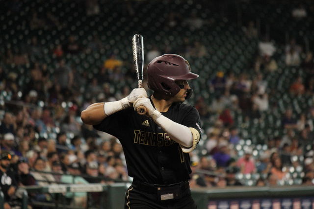 Texas State junior infielder Aaron Lugo (1) steps up to bat against LSU in the Astros Foundation Classic, March 3, 2024, at Minute Maid Park in Houston.