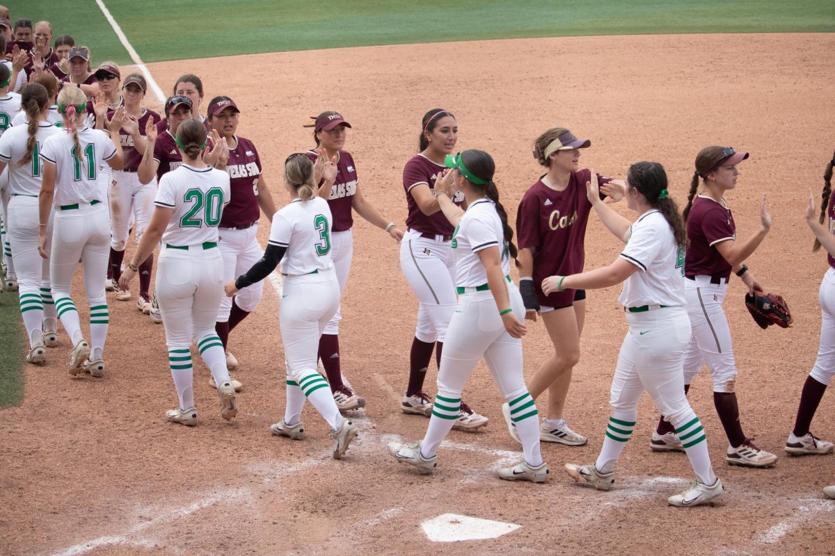 The Texas State softball team shakes hands after defeating Marshall in the Sun Belt Conference semifinals, Friday, May 10, 2024, at Bobcat Softball Stadium.