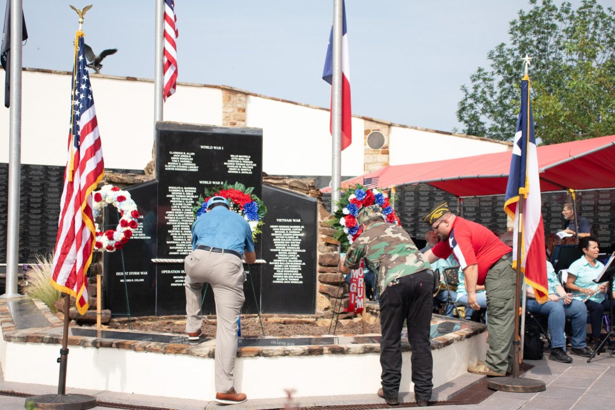 Wreaths to commemorate servicemen killed in action are placed at the Hays County Veterans Memorial during the 2024 Memorial Day Ceremony, Monday, May 27, 2024, near downtown San Marcos.
