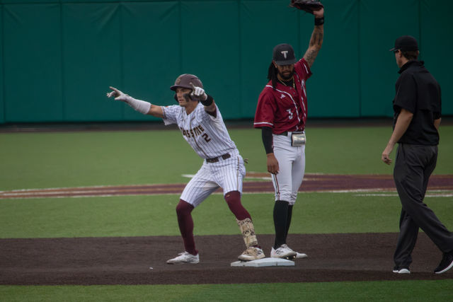 Texas State sophomore second baseman Chase Mora (2) celebrates hitting a double during the game against Troy, Saturday, May 11th, 2024, at Bobcat Ballpark.