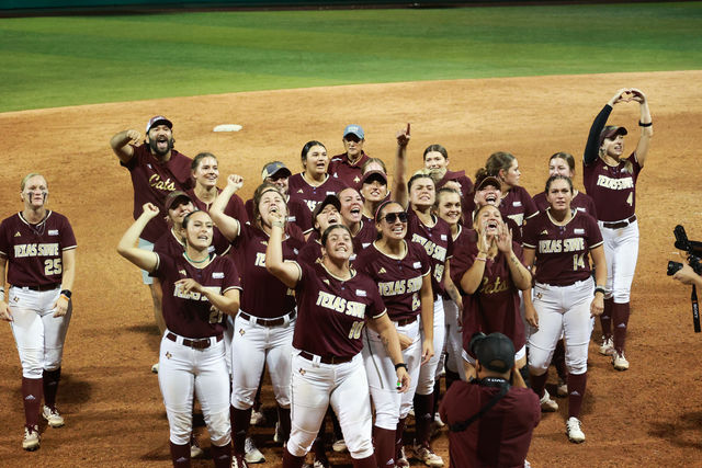 The Texas State softball team celebrates its win against South Alabama in the Sun Belt Conference tournament semifinal game, Friday, May 10, 2024, at Bobcat Softball Stadium.