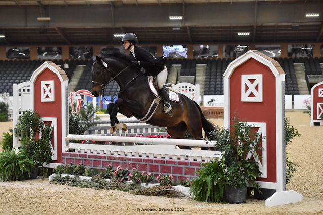 Texas State psychology senior Ali Smith, competes in Cacchione Cup Over Fences at the IHSA Nationals, Saturday, May 4, 2024, at Tyron International Equestrian Center and Resort in Tyron, North Carolina.