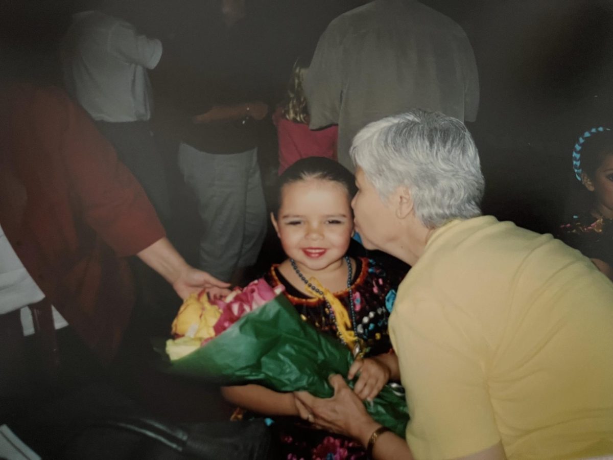 Brianna Chavez and her grandma Agapita Castro after her first Ballet Folklorico performance in 2005 at the Oswaldo A.B. Cantu/Pan American Recreation Center in Austin, Texas.