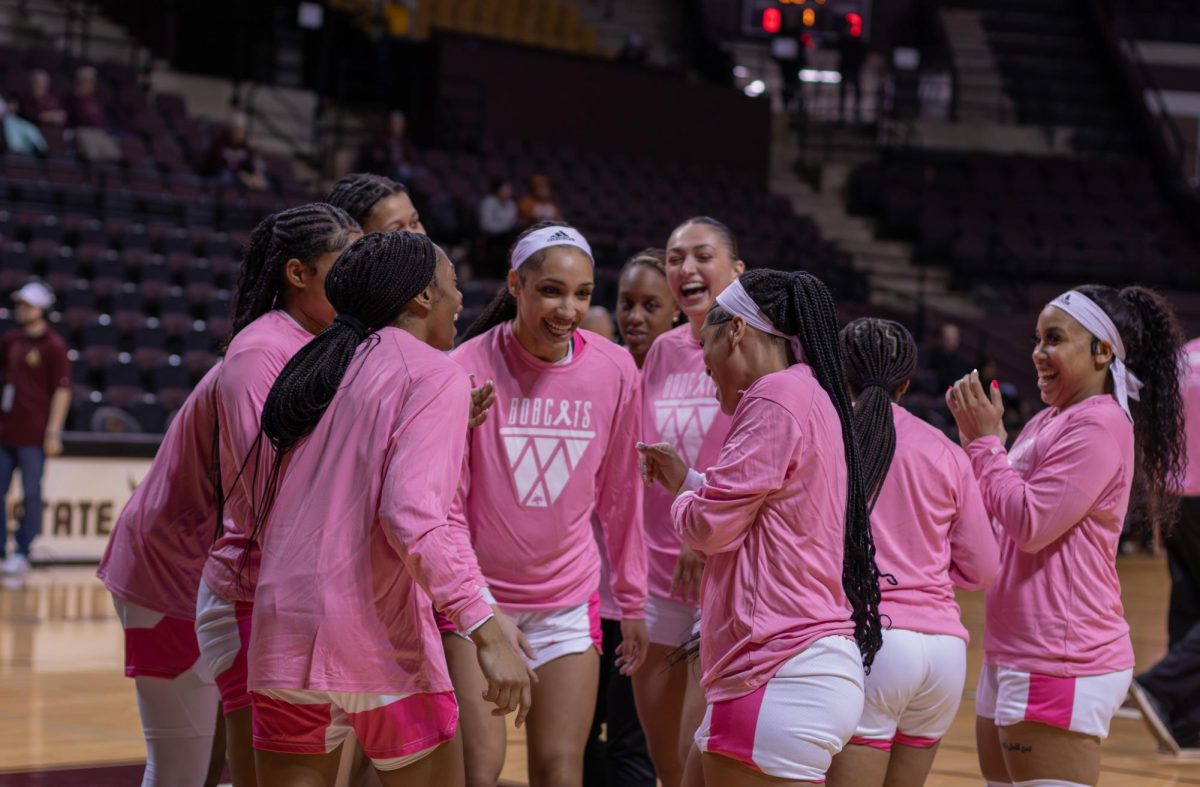 The Texas State womens basketball team huddles for pregame traditions, Thursday, Feb. 2, 2023, at Strahan Arena.