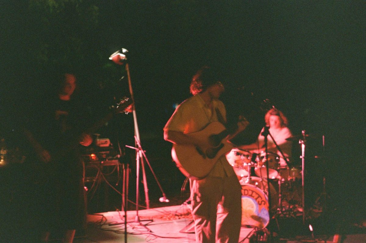 Musicians Ollie Ansley (left), Haddon Stauffer (center), and Cole Thomas (right) perform music off of Stauffer's album "Light," Wednesday, May 17, 2024, at Private Park. Photo courtesy of Christopher Kopen.