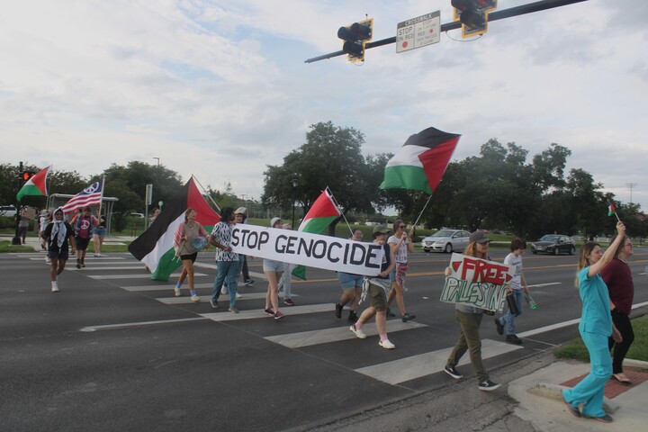 San Marcos residents march Wednesday, June 24, 2024 along Hopkins Street in protest of Israeli Prime Minister Benjamin Netanyahus speech to joint Congress. 