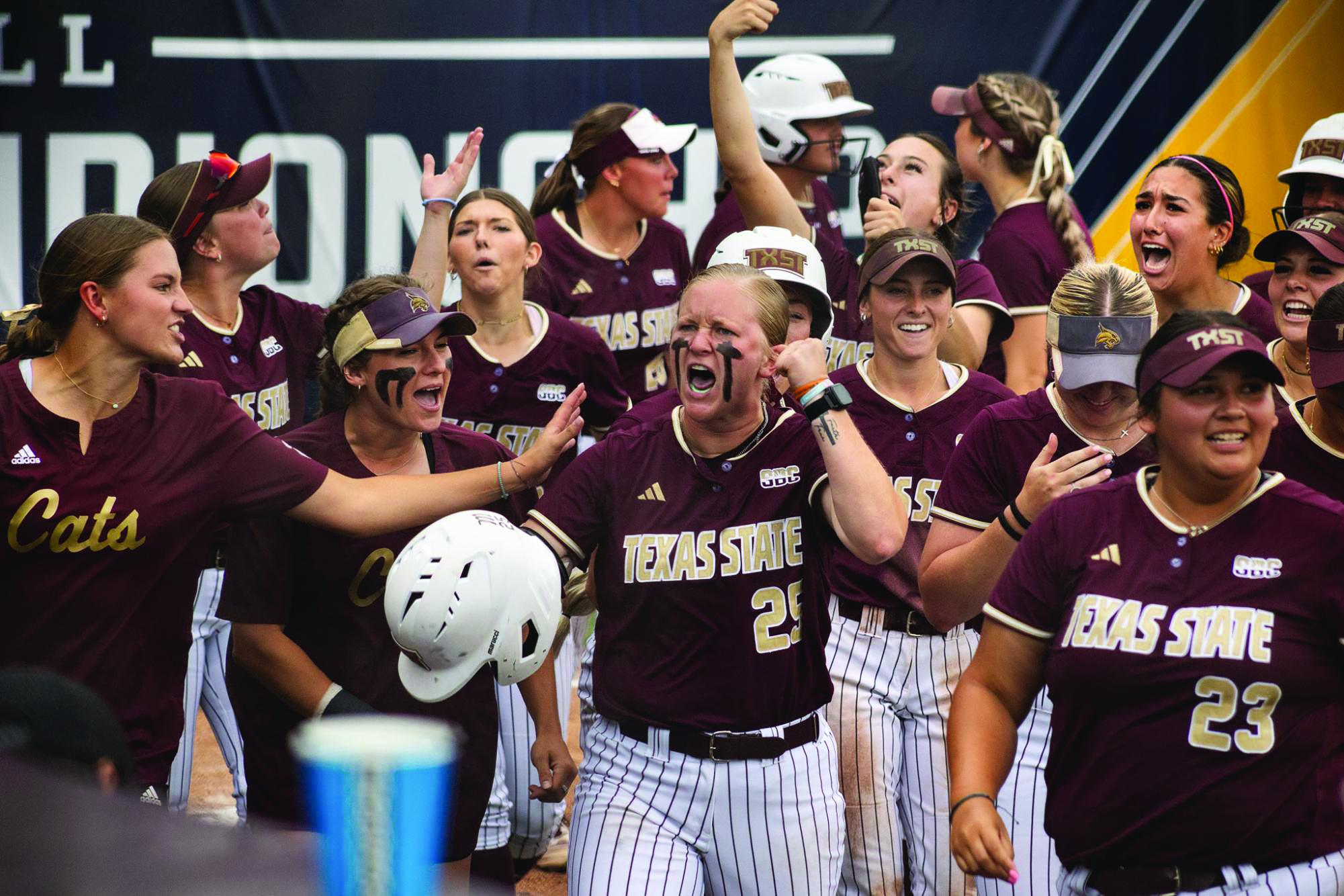 The Texas State softball team celebrate J.J. Smith's (25) home run against the University of Louisiana-Lafayette in the Sun Belt Conference Championship game, Saturday, May 11, 2024, at Bobcat Softball Stadium.