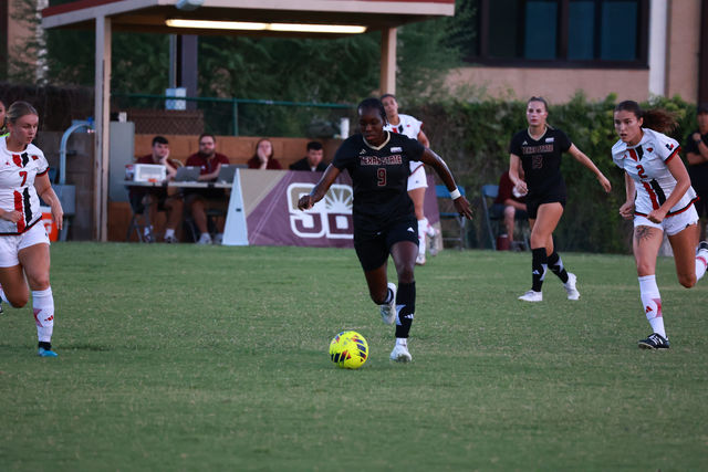 Texas State forward junior Mady Soumare (9) dribbles the ball across the field during the game against Incarnate Word, Sunday, Aug. 25, 2024 at Bobcat Soccer Complex.