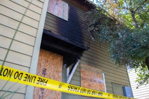 Unit 6115 is sealed off with caution tape after a fire in a vacant apartment at The Cottages at San Marcos on Wednesday, Aug. 21, 2024.