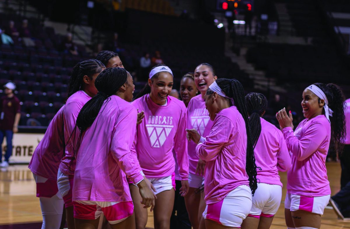 The Texas State women's basketball team huddles for pregame traditions, Thursday, Feb. 2, 2023, at Strahan Arena.