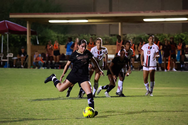 Texas State forward freshman Sydney Bassa (20) takes a penalty kick during the game against Incarnate Word, Sunday, Aug. 25, 2024, at Bobcat Soccer Complex.