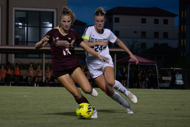 Texas State junior midfielder Chloe Jones (13) fights for control of the ball against her defender during the game against Colorado State, Thursday, Aug. 29, 2024, at Bobcat Soccer Complex.